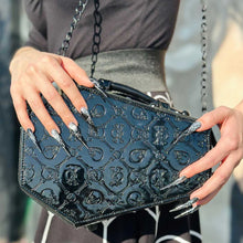 Load image into Gallery viewer, model with spider web fingernails holding bag