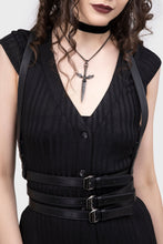 Load image into Gallery viewer, Model wearing a black outfit with harness on a white background