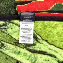 Load image into Gallery viewer, Micro plush fleece throw blanket features the iconic Frankenstein in a mug shot with green background; mirror image on back. Durable stitched-finished edge.