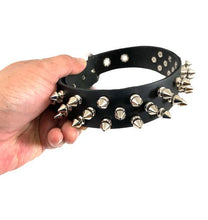 Load image into Gallery viewer, Black leather collar with three rows of silver 1/2" tree spikes.