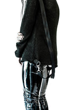 Load image into Gallery viewer, back side view of unisex Black semi sheer knit fabric with stretch fit. Sweater has removable back straps with D-ring details.
