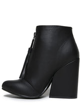 Load image into Gallery viewer, inner side of Women's black vegan leather ankle boot with large wedge and front zip with black vegan leather tassel pull.