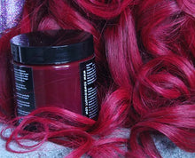 Load image into Gallery viewer, hair dye on display next to model
