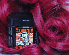 Load image into Gallery viewer, hair dye on display next to model

