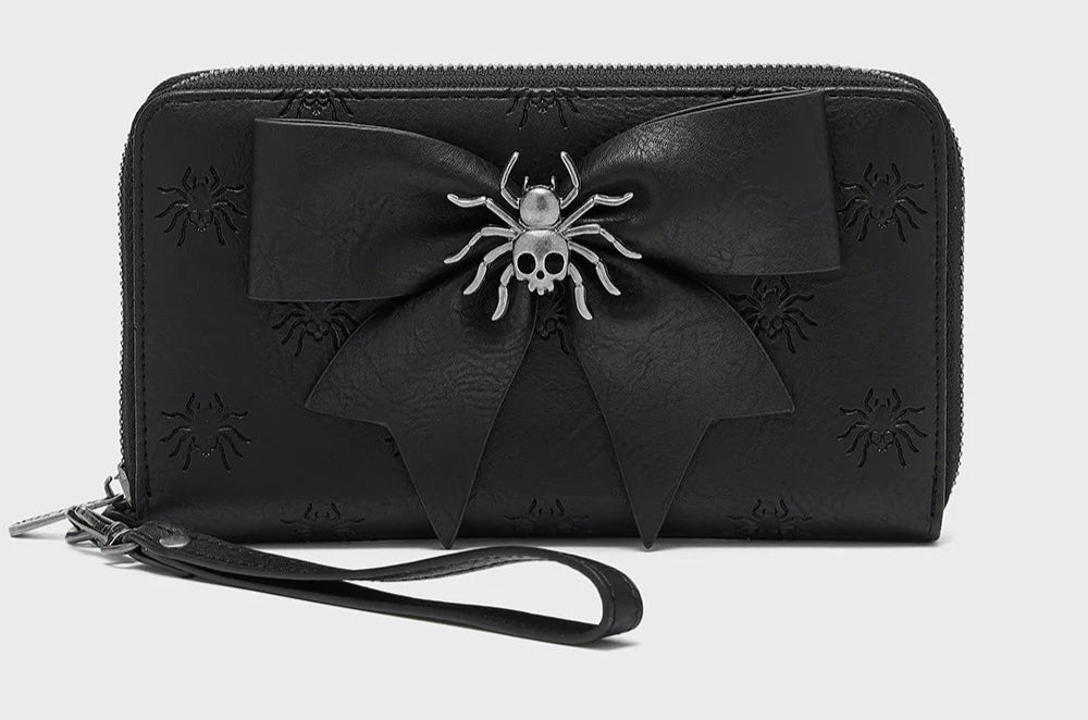 Black wallet with a spider design on a light gray background