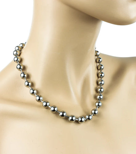 necklace on mannequin