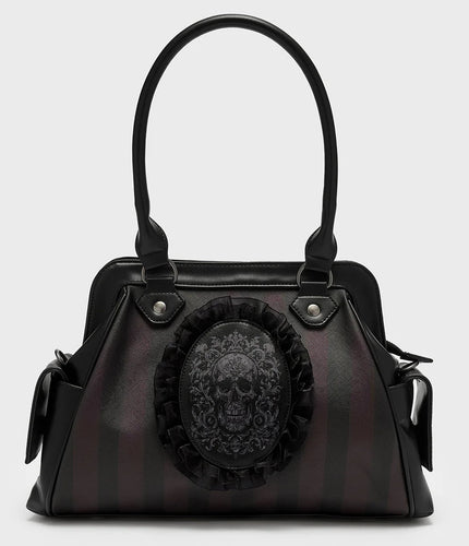 Black handbag with skull design on a light gray background