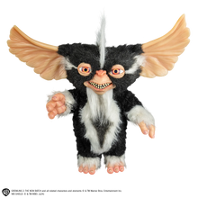 Load image into Gallery viewer, Toy figure of a character with large ears and a striped body on a white background
