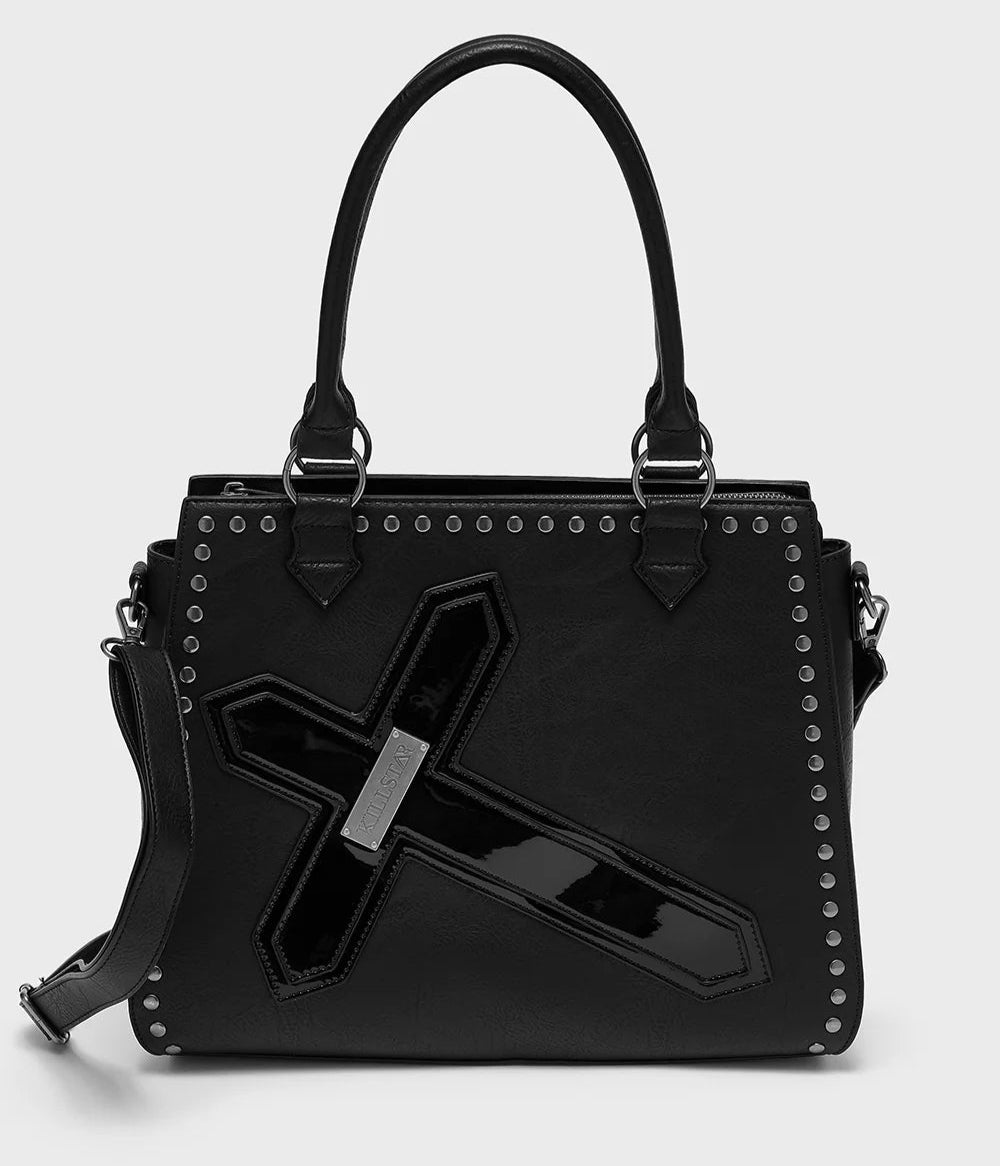 Black handbag with a unique design on a white background