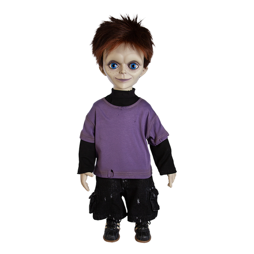 Doll is clothed with black jeans, long sleeve black shirt with short sleeve purple shirt layered over top and black shoes with white side stripes.