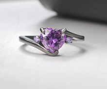 Load image into Gallery viewer, Black band with purple cubic zirconia heart.
