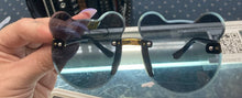 Load image into Gallery viewer, model holding glasses
