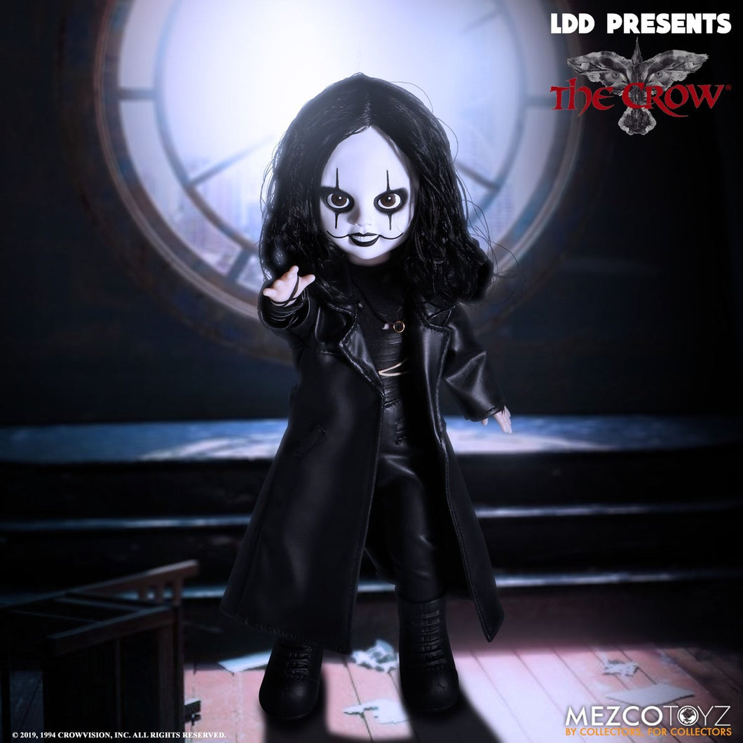 front of doll