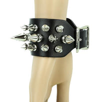 Load image into Gallery viewer, Black leather bracelet with three rows of silver spikes. Top and bottom row consist of 1/2&quot; silver spikes. Center row consists of 1&quot; silver spikes.
