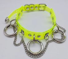 Load image into Gallery viewer, top view of neon green see through choker with Three O rings, Hanging chain and Adjustable buckle closure
