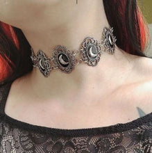 Load image into Gallery viewer, Brass colored multi crescent moon repeat pattern choker.
