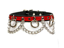 Load image into Gallery viewer, Black and red leather collar with silver hanging O rings and silver hanging chain.
