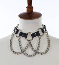 Load image into Gallery viewer, Black leather collar with multiple silver O rings with silver hanging chains.
