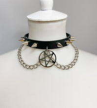 Load image into Gallery viewer, Black leather collar with 1/2&quot; silver spikes, silver chain detail, and 2&quot; silver inverted pentagram hanging from front center.
