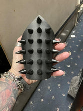 Load image into Gallery viewer, Triangular small black leather gauntlet bracelet with black cone spikes.
