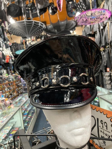 Black patent leather captains hat. Front of hat has three silver O ring details across the front.