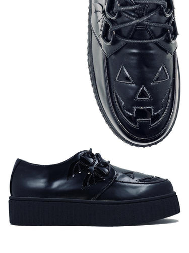 Black vegan leather creeper shoes with Jack-O-Lantern cut out face on top of shoe. Shoe has black round laces. Shoes are 100% vegan leather and black rubber outsole.
