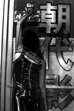 Load image into Gallery viewer, Black fishnet shrug with lace up back detail &amp; thumbholes.
