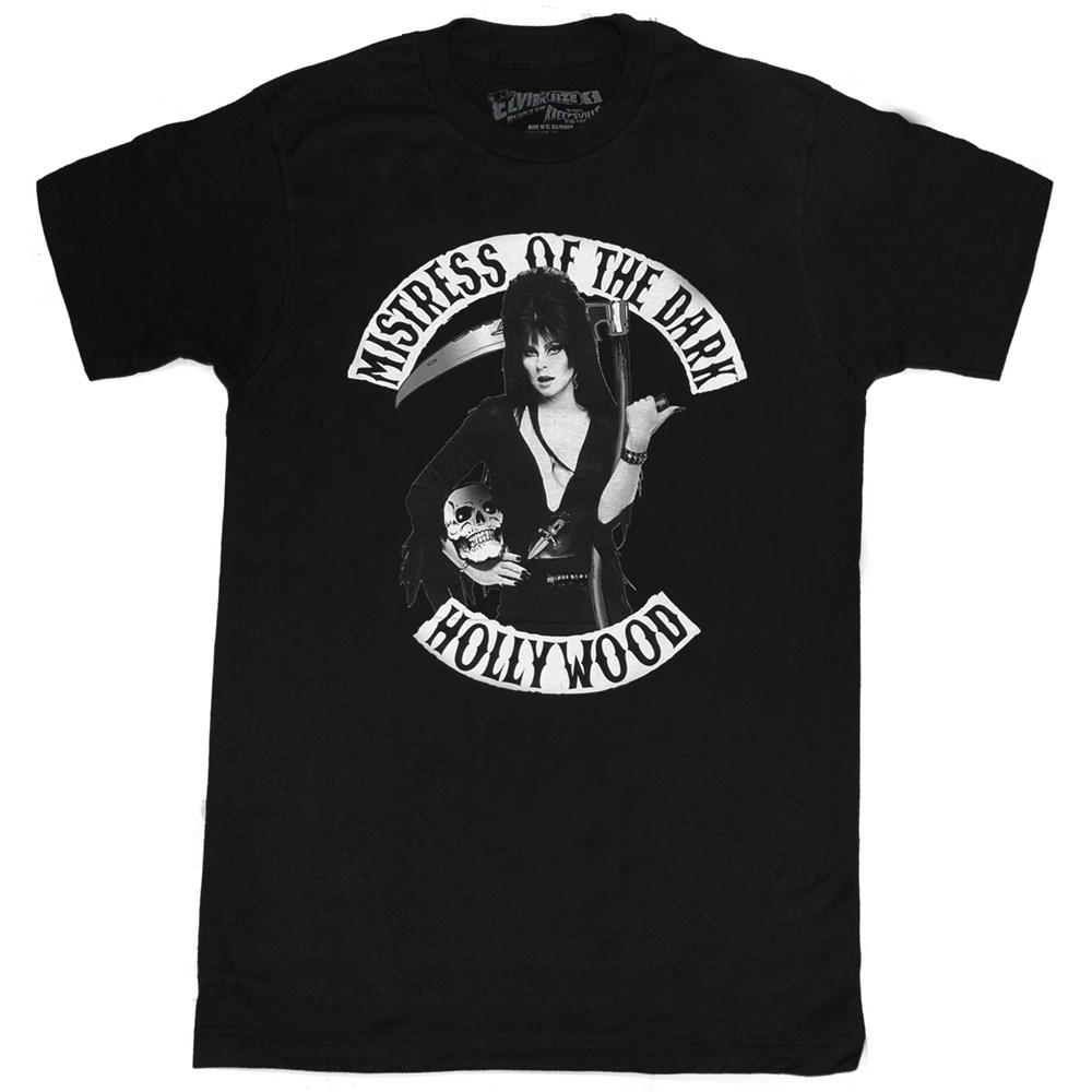 front of Black t-shirt with print of Elvira on front side. Print shows Elvira holding a skeleton and scythe. Top of shirt says 