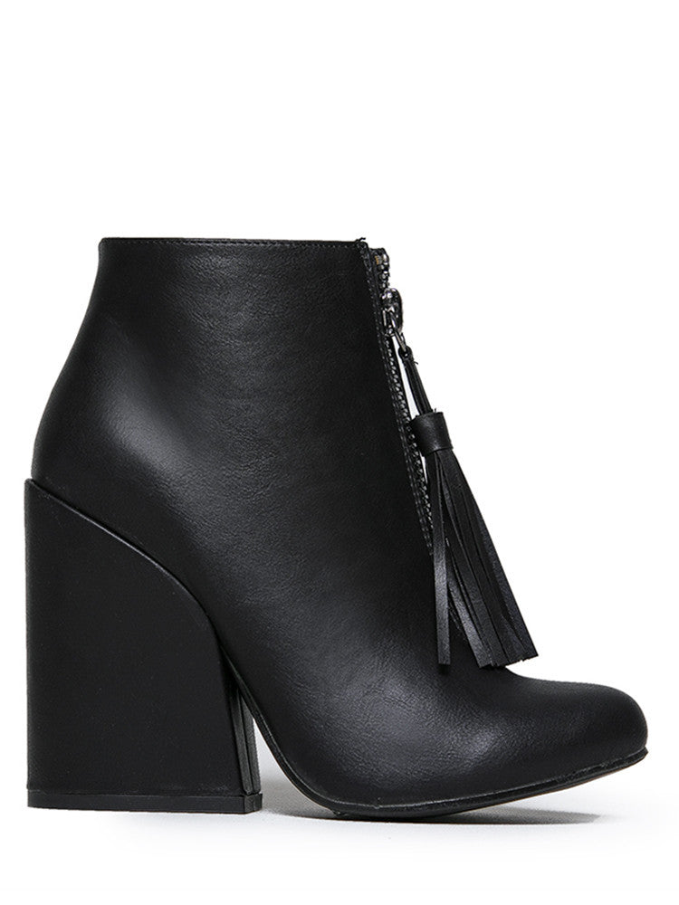 outer view of Women's black vegan leather ankle boot with large wedge and front zip with black vegan leather tassel pull.