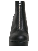 Load image into Gallery viewer, front view of black vegan leather sleek 6.5&quot; heel boot with silver front zip. Bottom of boot has a fanned front grip for better stability when walking.
