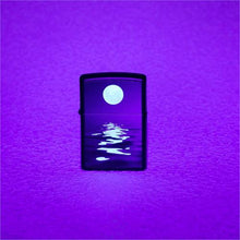 Load image into Gallery viewer, front of zippo on display under blacklight
