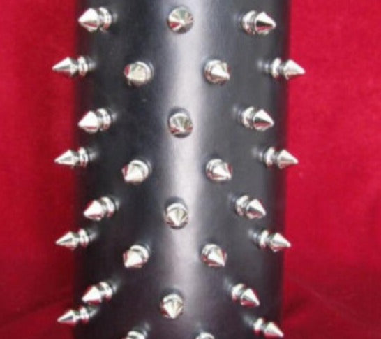 black leather gauntlet bracelet with five rows of small silver tree spikes