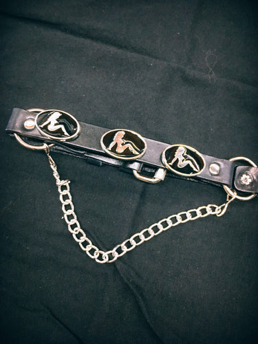 Three mudflap girl silver and black metal pins, with hanging chain and adjustable buckle closure