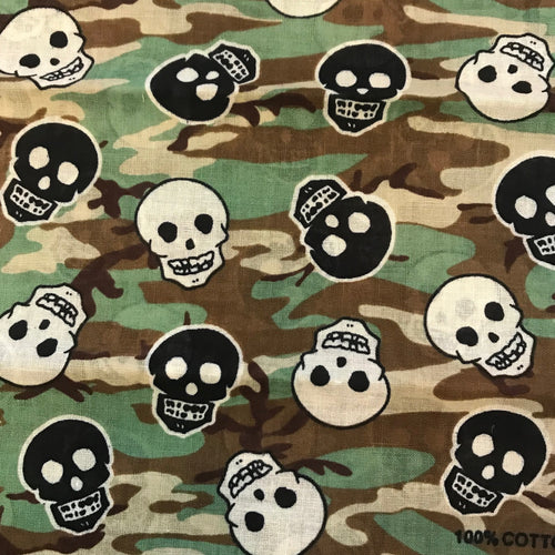 Camouflage bandana with black and white skull repeat pattern.