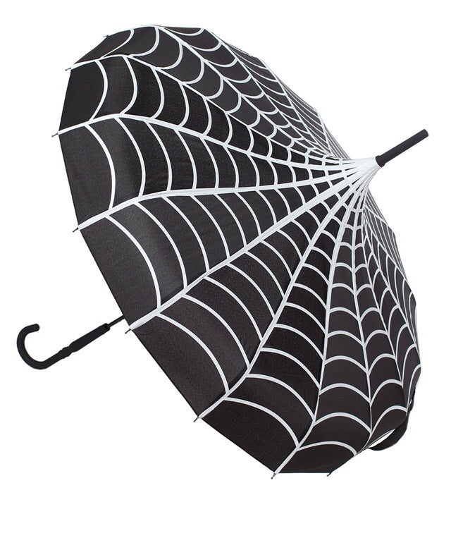 side view of Vintage-inspired classic shape, black umbrella with white spiderwebs, featuring a domed top to shield you from the rain or sun, with a slender, black J-shaped handle.