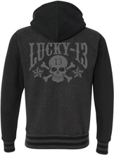 Load image into Gallery viewer, back of Lucky 13 charcoal gray heather black zip-up hooded sweatshirt has jacquard ribbing at cuffs and waistband and gunmetal eyelets. Hoodie has classic &quot;Skull Stars&quot; logo in grey (tonal) on the back with the skull stars embroidered patch (also tonal in dark charcoal) on the front left chest.
