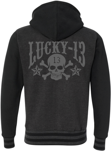 back of Lucky 13 charcoal gray heather black zip-up hooded sweatshirt has jacquard ribbing at cuffs and waistband and gunmetal eyelets. Hoodie has classic 