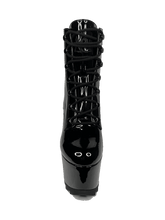 Load image into Gallery viewer, front view of Black vegan shiny patent leather tall military style platform boot with black cotton laces and black inner zipper. Front of platform has a fanned grip for better stability when walking.

