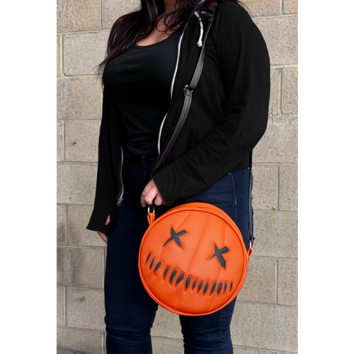 model with bag over shoulder