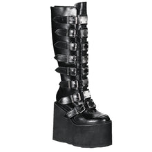 Load image into Gallery viewer, outer side view of black vegan leather 5 1/2&quot; wedge platform Goth punk gogo knee high boot Adjustable straps from top to bottom of boot, with metal plates up the front with full back zipper
