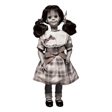 Load image into Gallery viewer, talky tina replica doll with pig tails, wearing a plaid dress with bow around the waist, and black flats with white socks
