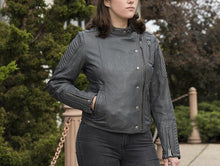 Load image into Gallery viewer, model wearing Black leather sheepskin jacket. Jacket is designed to have a classic fit, has zip sleeves, two side hand pockets, one chest pocket and two interior pockets. Jacket is fully lined. 
